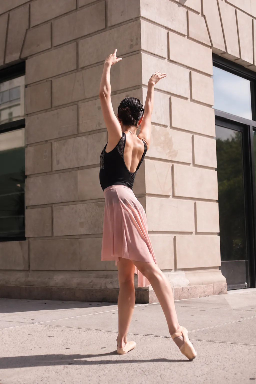 Fernanda practicing ballet in warm afternoon light