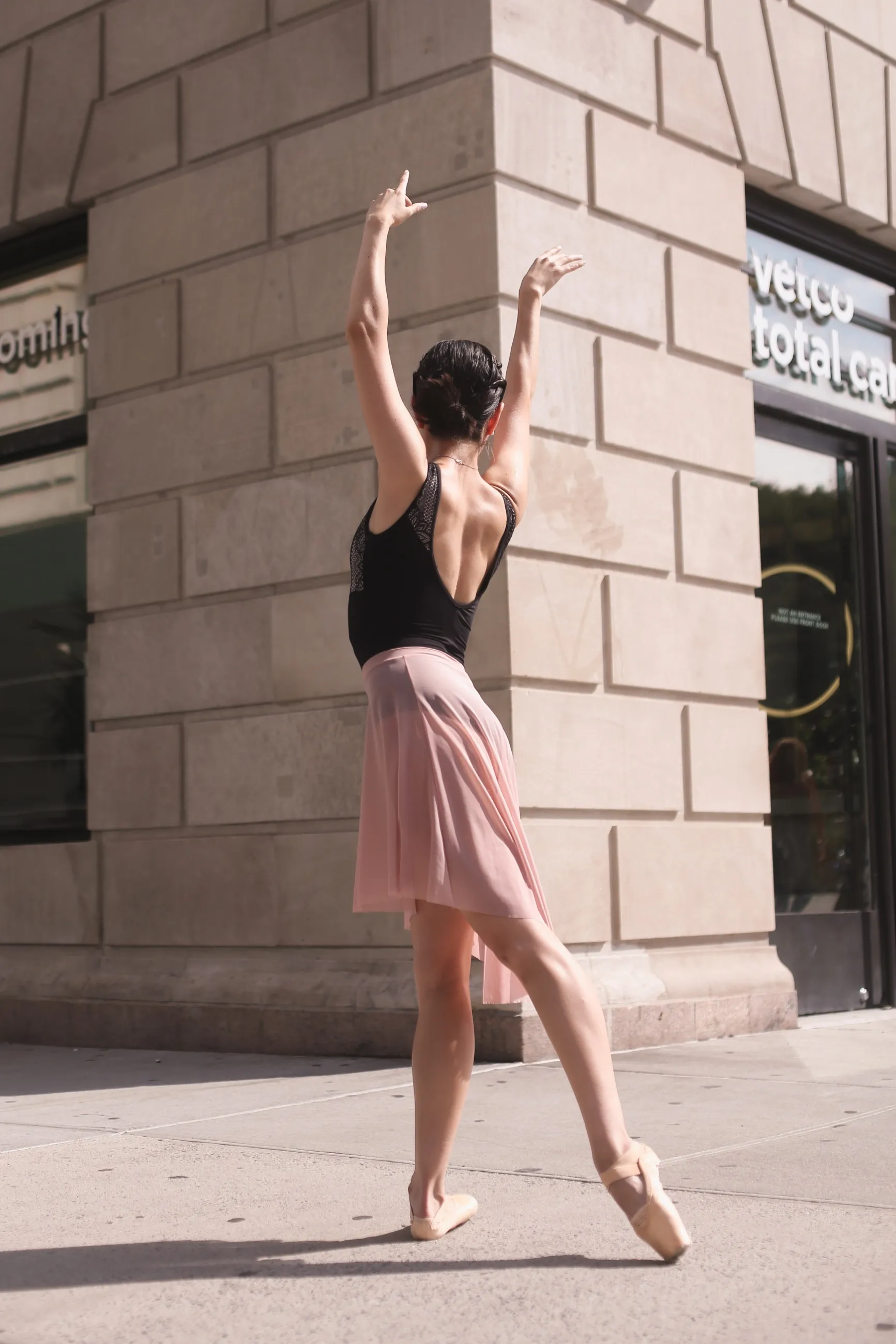 Fernanda practicing ballet in warm afternoon light